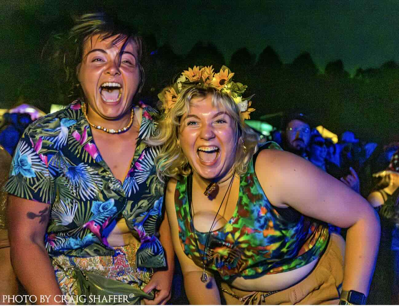 two girls dancing in crowd at domefest 2025