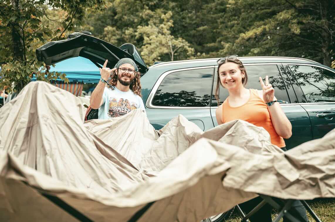 campers getting setup at domefest 2025 at ace adventure resort in the new river gorge