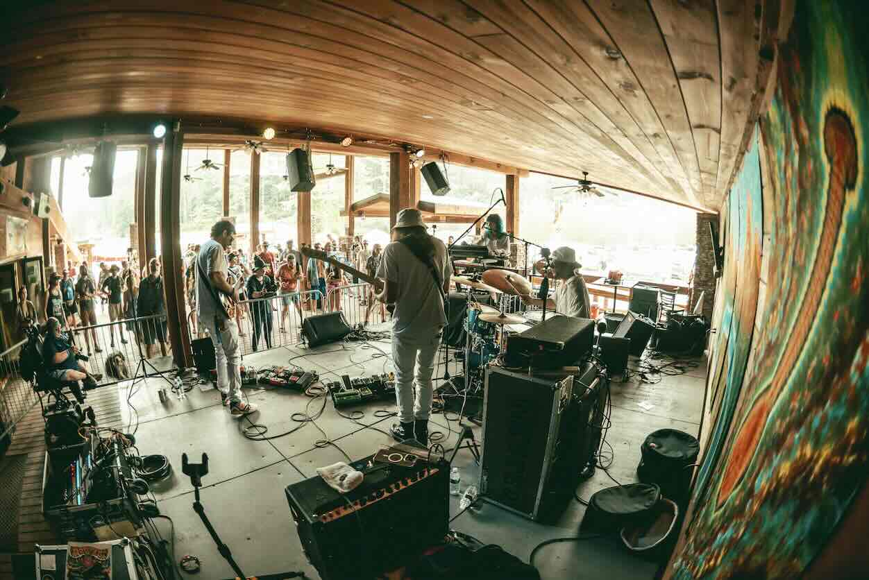 band performing on the lost paddle lake stage during domefest 2025 at ace adventure resort