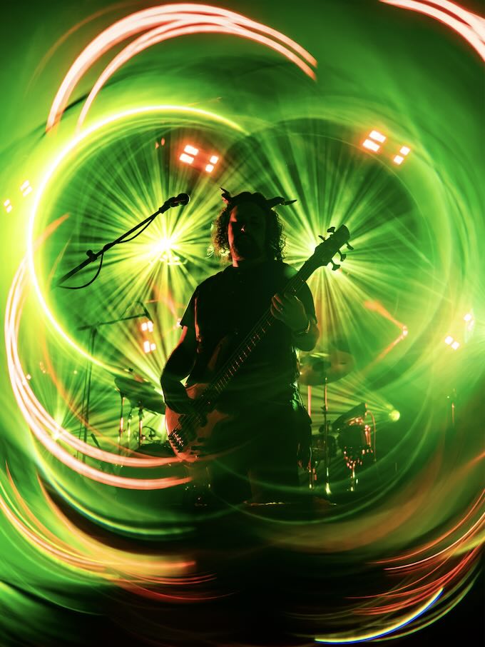 ben playing bass at domefest 2026 at ace adventure resort